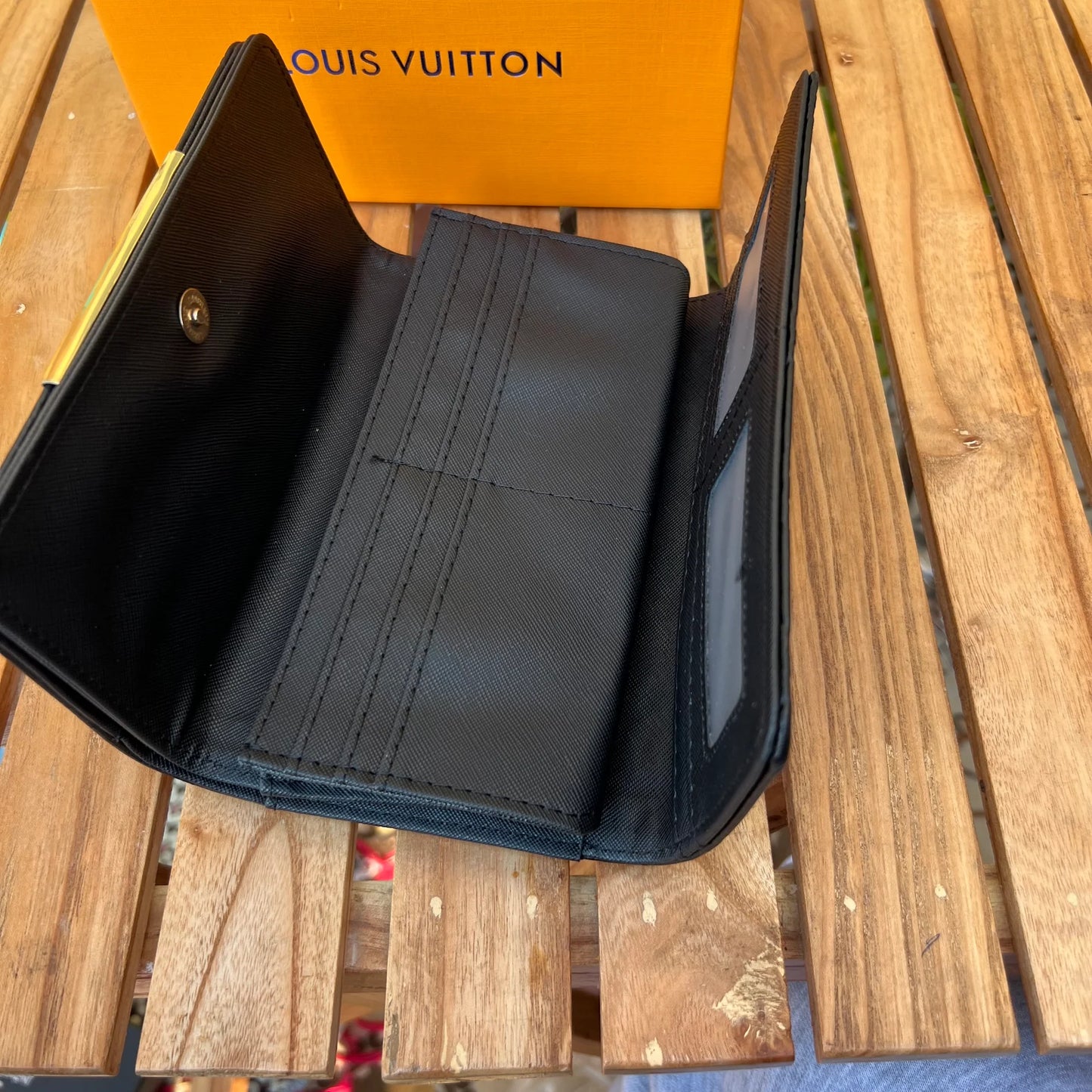 LV Signature Black Wallet – Luxurious Charm