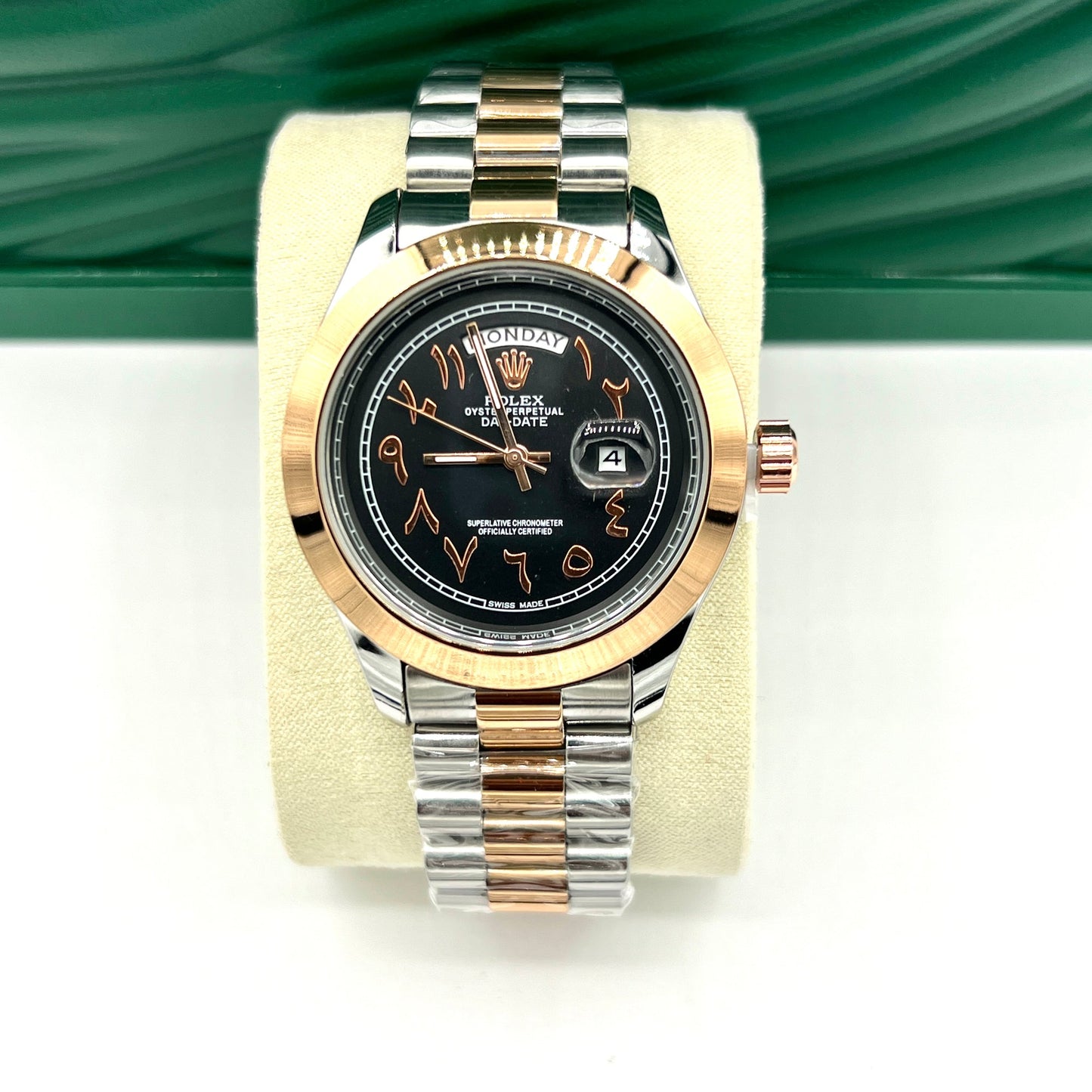 "ROLEX  Black Dial Watch with Arabic Numbers in Silver and Gold Elegance"