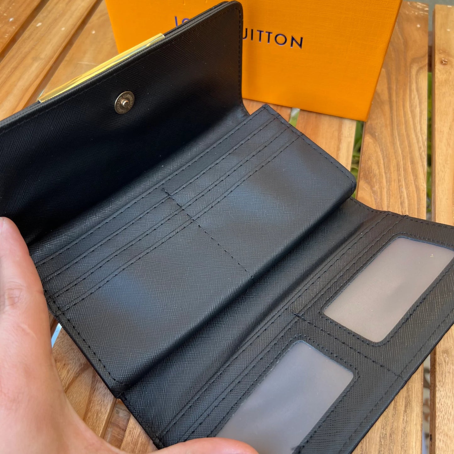 LV Signature Black Wallet – Luxurious Charm